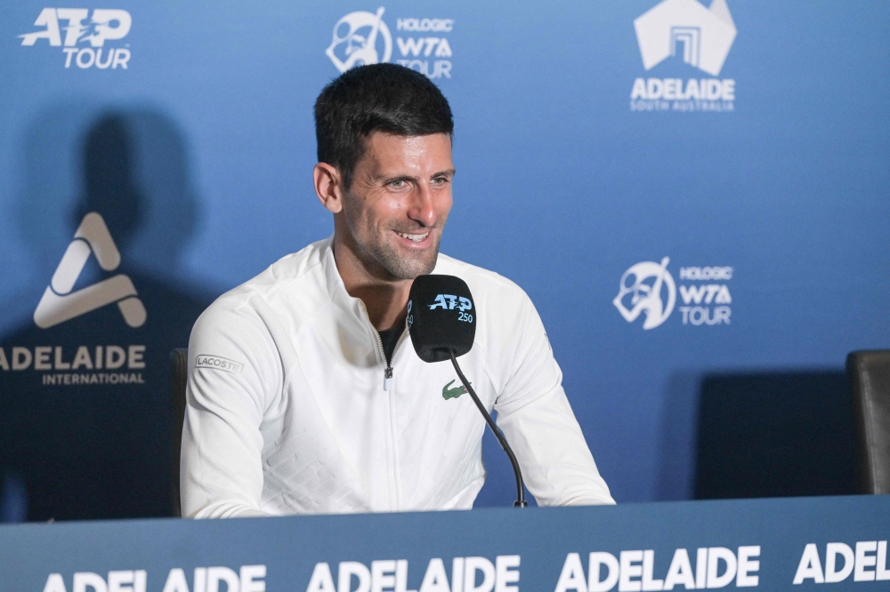Serbian tennis player Novak Djokovic attends a press conference after winning his first round match against France's Constant Lestienne at the ATP Adelaide International tournament in Adelaide on January 3, 2023. (Photo by Brenton EDWARDS / AFP)