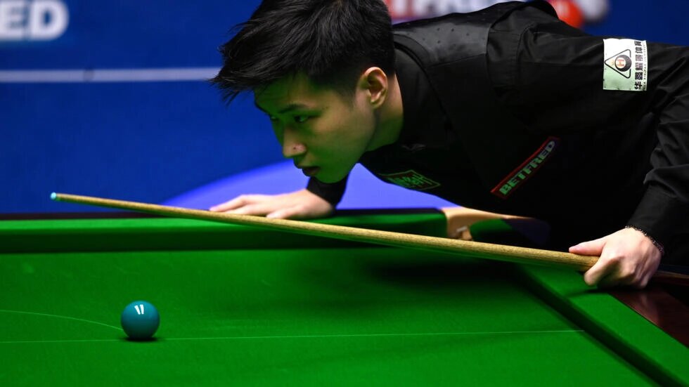 Suspended - China's Zhao Xintong.  Photo: Oli SCARFF / AFP
