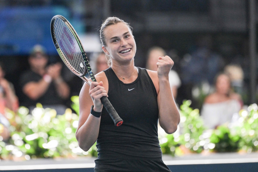 Belarusian tennis player Aryna Sabalenka celebrates after winning the final of the WTA Adelaide International tournament against Czech Linda Noskova in Adelaide on January 8, 2023. (Photo by Brenton EDWARDS / AFP)