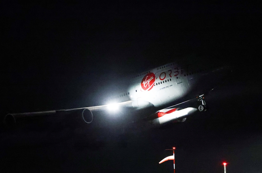 The plane takes off ahead of Britain's first satellite launch, at Cornwall Airport Newquay, in Cornwall, Britain January 9, 2023. REUTERS/Henry Nicholls