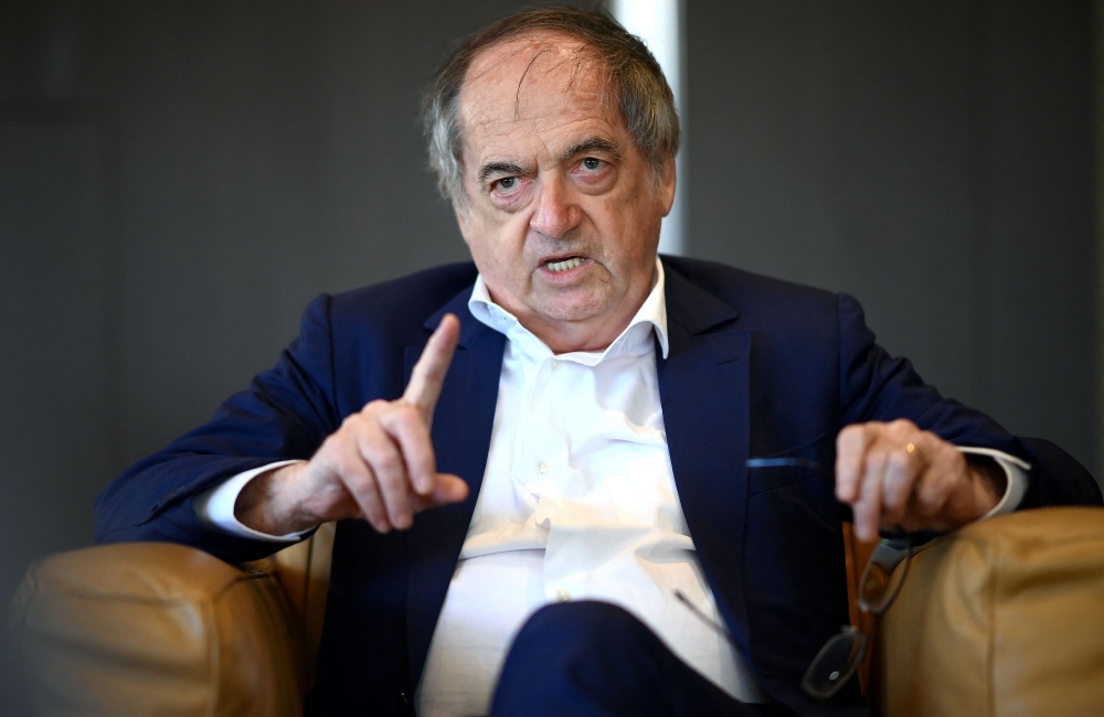 In this file photo taken on March 8, 2021 President of French football association (FFF) Noel Le Graet answers journalists' question in Paris.  (Photo by FRANCK FIFE / AFP)