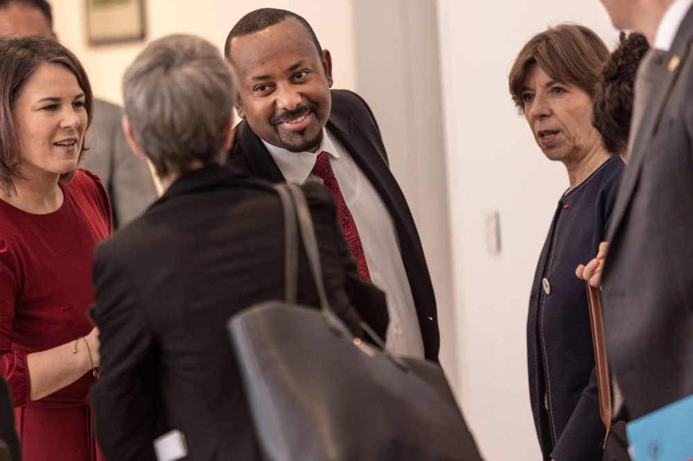 Ethiopia Prime Minister Abiy Ahmed receives German Federal Minister for Foreign Affairs, Annalena Baerbock (left) and French Foreign and European Affairs Minister, Catherine Colonna (third right) and their delegations at the Prime Minister office in Addis Ababa, Ethiopia, on January 12, 2023. (Photo by Amanuel Sileshi / AFP)
