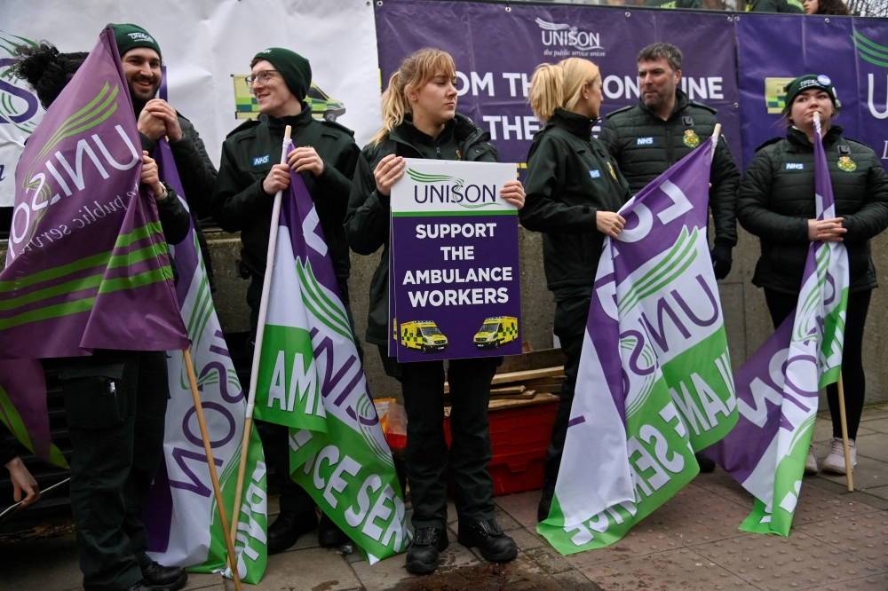 Ambulance workers strike outside their Waterloo station, amid a dispute with the government over pay, in London, Britain January 11, 2023. Reuters/Toby Melville/File Photo