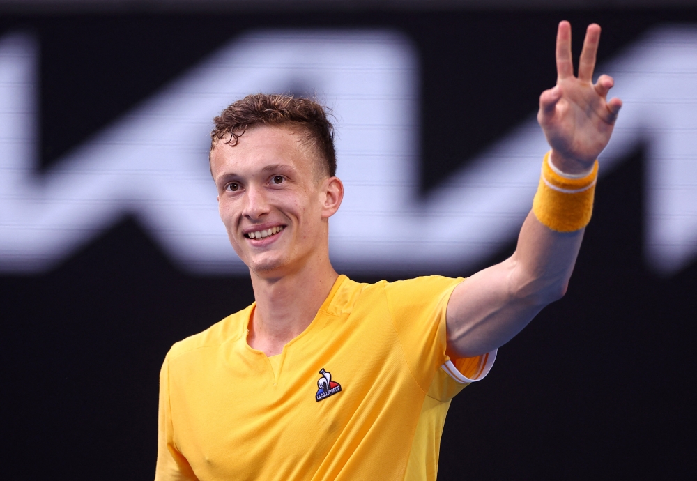 January 22, 2023 Czech Republic's Jiri Lehecka celebrates after winning his fourth round match against Canada's Felix Auger Aliassime REUTERS/Carl Recine
