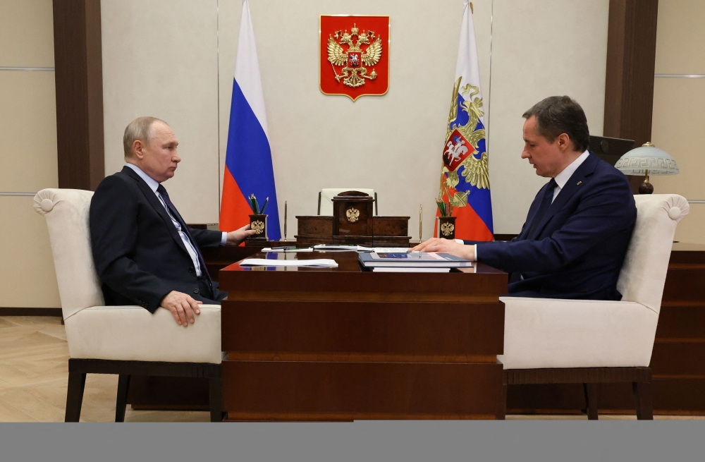 Russian President Vladimir Putin meets with the Belgorod region governor Vyacheslav Gladkov at the Novo-Ogaryovo state residence outside Moscow on January 24, 2023.  (Photo by Mikhail KLIMENTYEV / SPUTNIK / AFP)