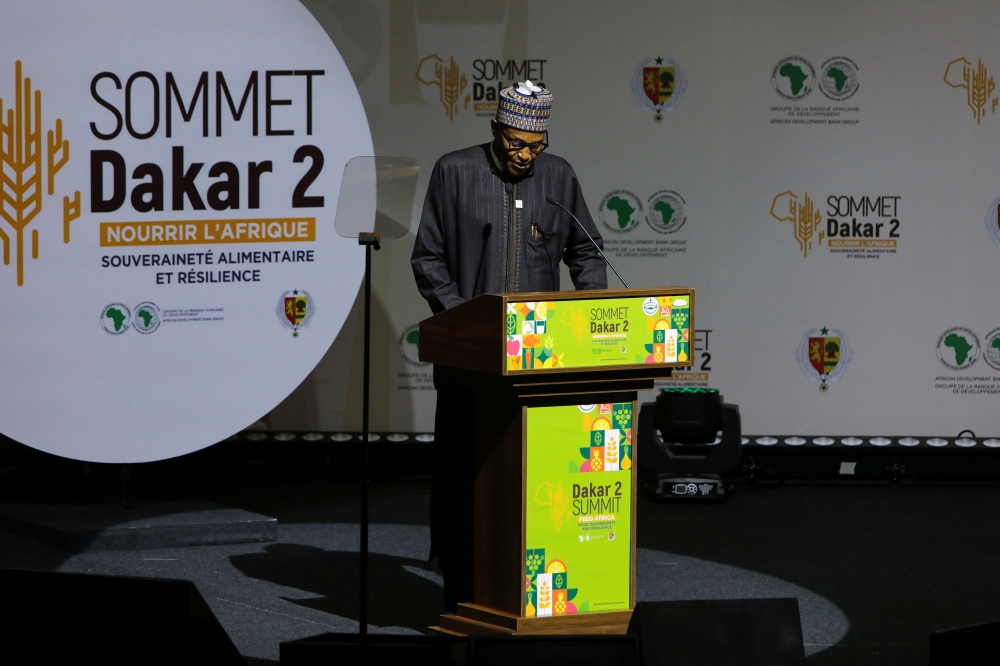 Nigerian President Muhammadu Buhari gives a speech as he attends the Dakar summit under the theme 