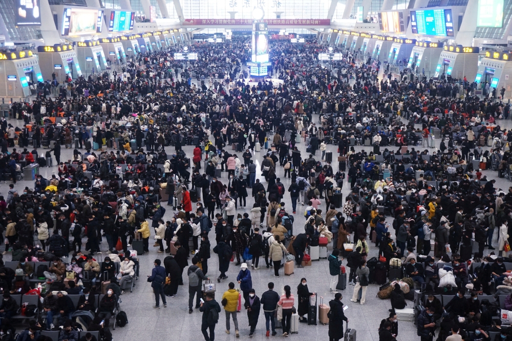 Travellers wait for their trains at Hangzhou East railway station during the Spring Festival travel rush ahead of the Chinese Lunar New Year, in Hangzhou, Zhejiang province, China January 20, 2023. File Photo: China Daily via REUTERS.