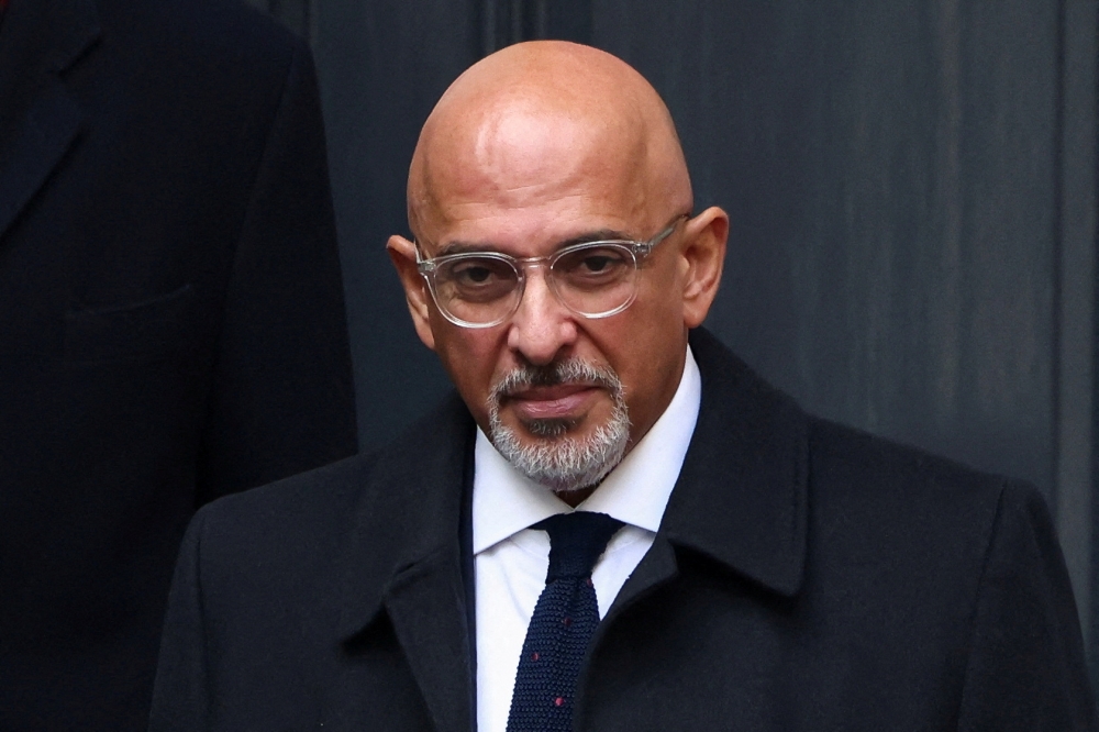 British Minister without Portfolio Nadhim Zahawi looks on outside the Conservative Party's headquarters in London, Britain January 23, 2023. REUTERS/Henry Nicholls/File Photo