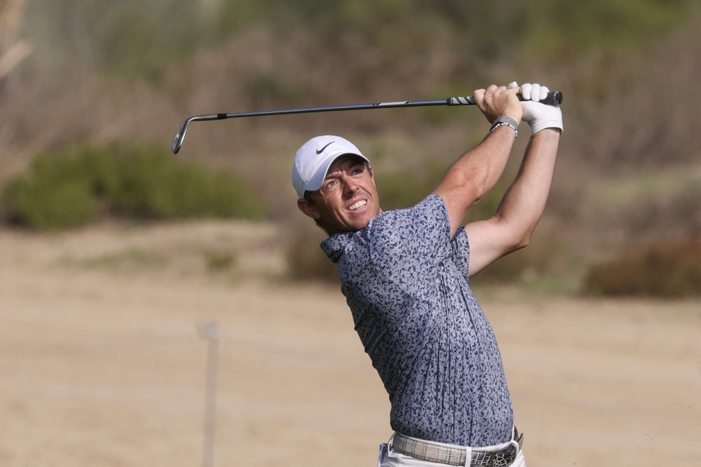 Rory Mcllroy of Northern Ireland plays a shot during the final of the Dubai Desert Classic 2023 Golf Championship at the Emirates Golf Club in Dubai, on January 30, 2023. (Photo by Karim Sahib / AFP)