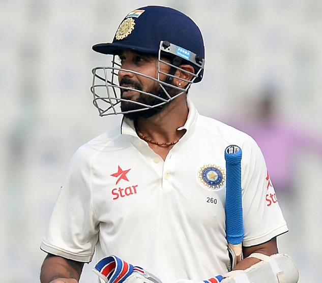 In this file photo taken on November 29, 2016, India's batsman Murli Vijay walks back after he was dismissed by England bowler Chris Woakes on the fourth day of the third Test match between India and England at The Punjab Cricket Association Stadium in Mohali. Photo by SAJJAD HUSSAIN / AFP