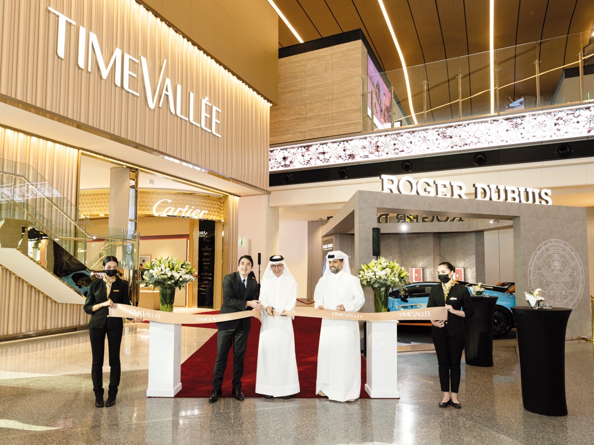 Qatar Airways Group Chief Executive H E Akbar Al Baker (centre), Hamad International Airport Chief Operating Officer, Eng Badr Al Meer (right) and TimeVallée CEO, Michael Guenoun during the ribbon cutting ceremony.