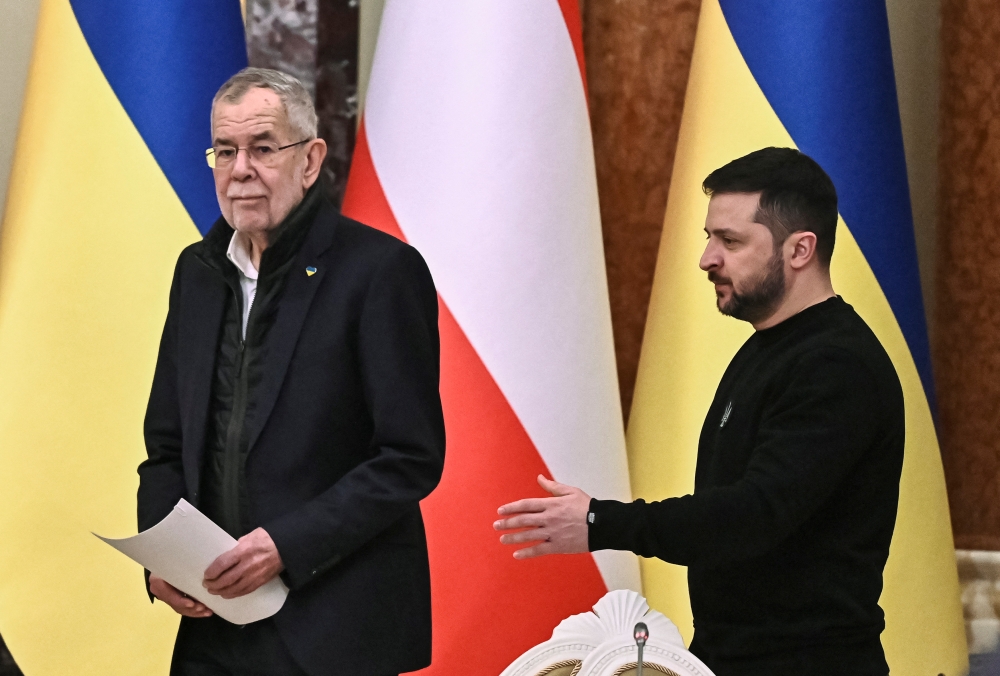 Ukraine's President Volodymyr Zelenskiy and Austrian President Alexander Van der Bellen arrive at a joint news briefing, amid Russia's attack on Ukraine, in Kiev, Ukraine on February 1, 2023. REUTERS/Viacheslav Ratynskyi