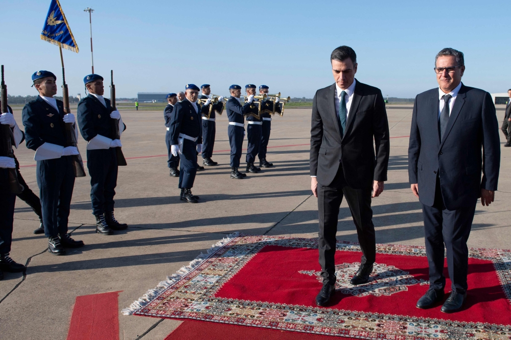 Prime Minister of Morocco Aziz Akhannouch (right) receives Spanish Prime Minister Pedro Sanchez upon his arrival in Rabat, on February 1, 2023. (Photo by AFP)
