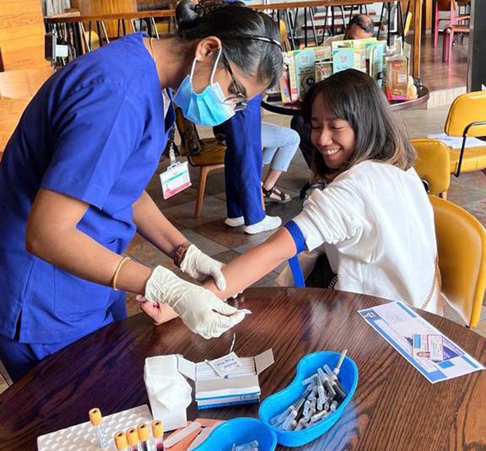 A health check-up being done on an employee.