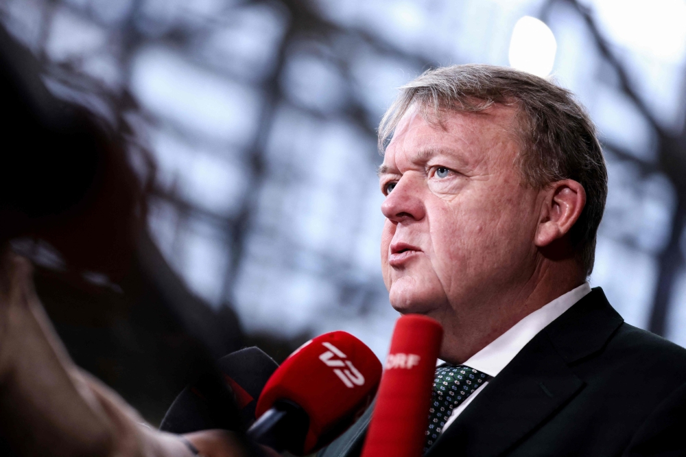 Denmark's Minister of Foreign Affairs Lars Lokke Rasmussen answers journalists' questions ahead of a meeting of the Foreign Affairs Council (FAC) at the EU headquarters in Brussels on February 20, 2023. (Photo by Kenzo TRIBOUILLARD / AFP)
