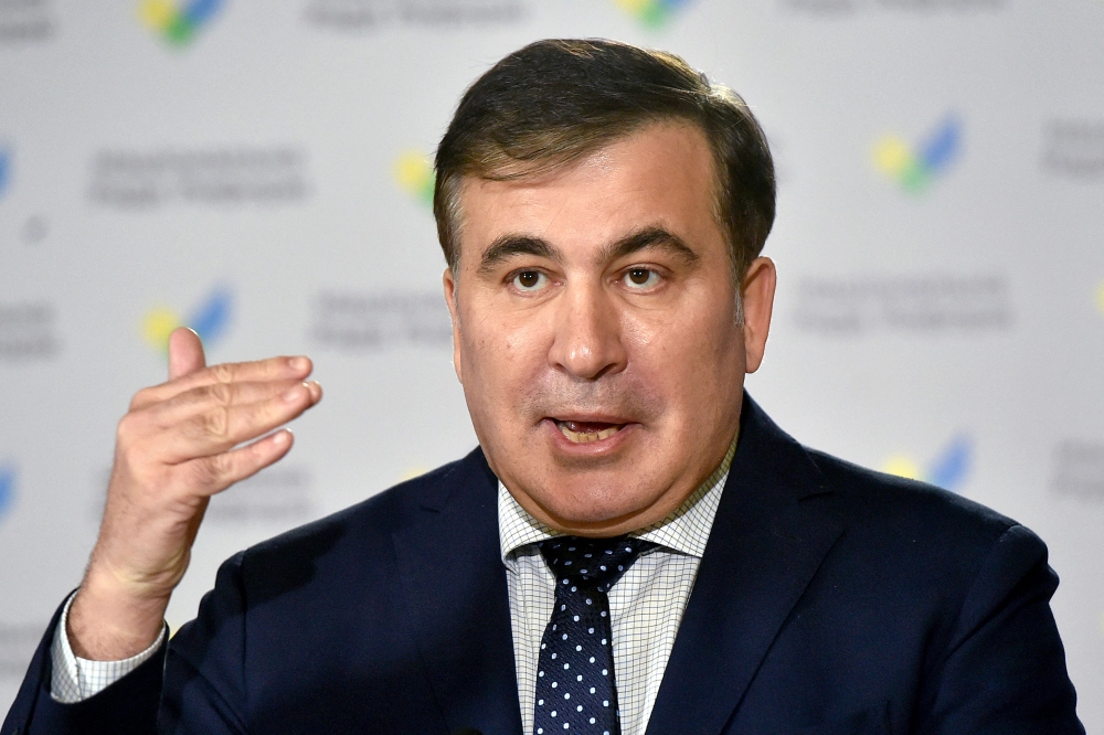 In this file photo taken on March 19, 2021 former Georgian President Mikheil Saakashvili gestures as he speaks during a press conference, in Kiev. - The health of Mikheil Saakashvili, Georgia's jailed ex-president, is deteriorating due to drastic weight loss, his doctors said on February 18, 2023 following international calls for his release. (Photo by Sergei SUPINSKY / AFP)