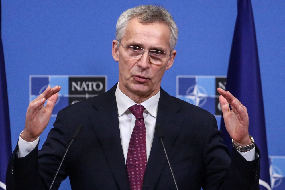 NATO Secretary General Jens Stoltenberg speaks during a press conference at the NATO headquarters in Brussels, on February 21, 2023. (Photo by Valeria Mongelli / AFP)