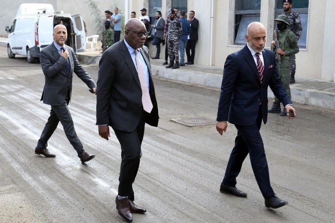 Abdoulaye Bathily (centre), UN Special Representative for Libya and Head of the United Nations Support Mission in Libya, arrives in Tripoli. (File/AFP)
