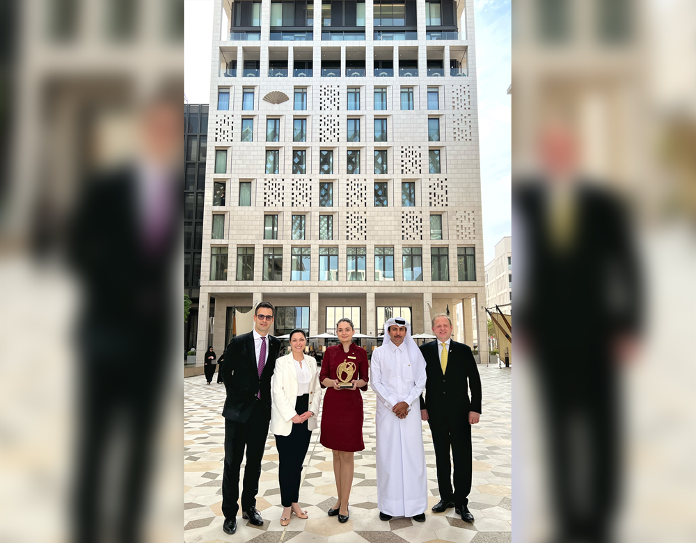 Guest Relations Supervisor Bianca Alexandra Bogdan and other officials with best receptionist award