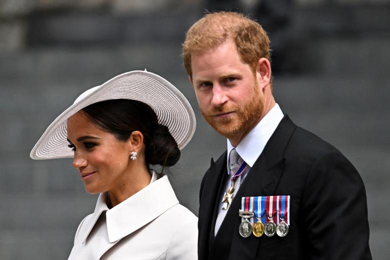 Prince Harry and his wife Meghan, Duchess of Sussex, leave after the National Service of Thanksgiving held as part of celebrations marking the Platinum Jubilee of Britain's Queen Elizabeth, in London. (REUTERS/Dylan Martinez)