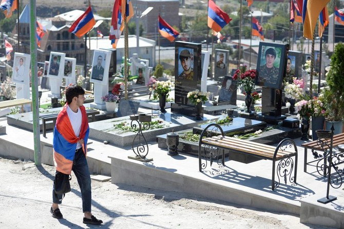 Relatives and friends of those killed in six weeks of fighting for control of the disputed Nagorno-Karabakh region visit the Yerablur Military Memorial Cemetery in Yerevan on September 27, 2022. File photo / AFP

