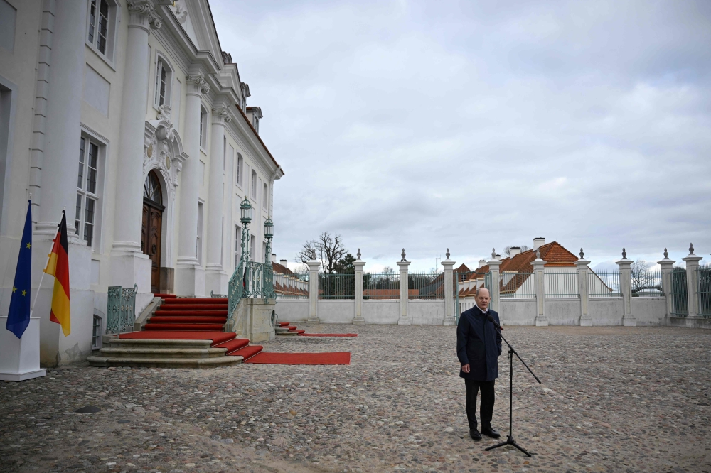 German Chancellor Olaf Scholz gives a press statement prior to the federal cabinet retreat Schloss Meseberg palace in Meseberg near Gransee, northeastern Germany on March 5, 2023. (Photo by Tobias SCHWARZ / AFP)