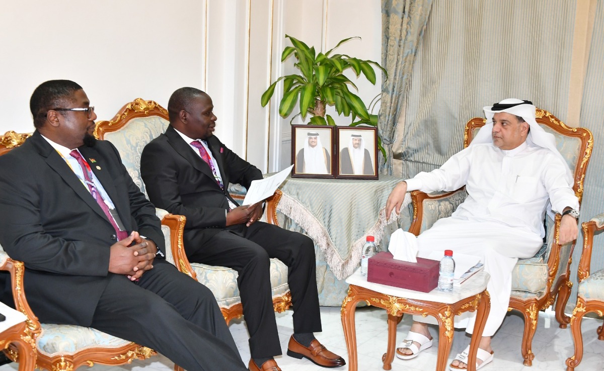 Minister of Trade and Industry of the Republic of Malawi H E Simplex Chithyola in the presence of QC board member Mohamed bin Ahmed Al Obaidli.
