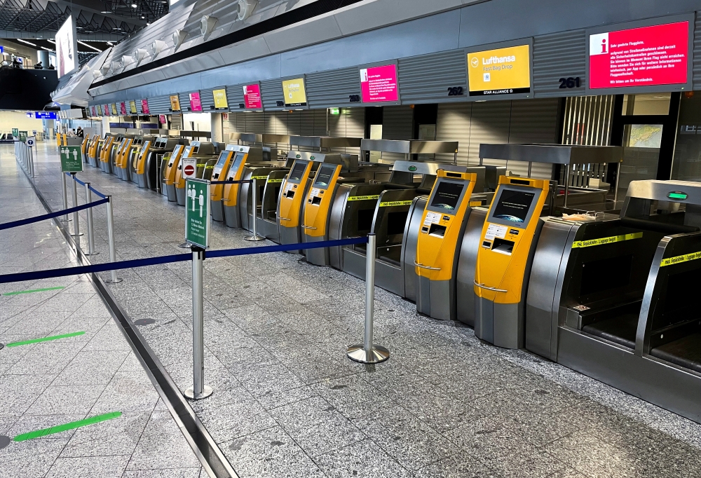 File photo: Empty counters of German airline Lufthansa at Frankfurt Airport are pictured during a strike of security staff at various German airports on March 15, 2022. (REUTERS/Timm Reichert)

