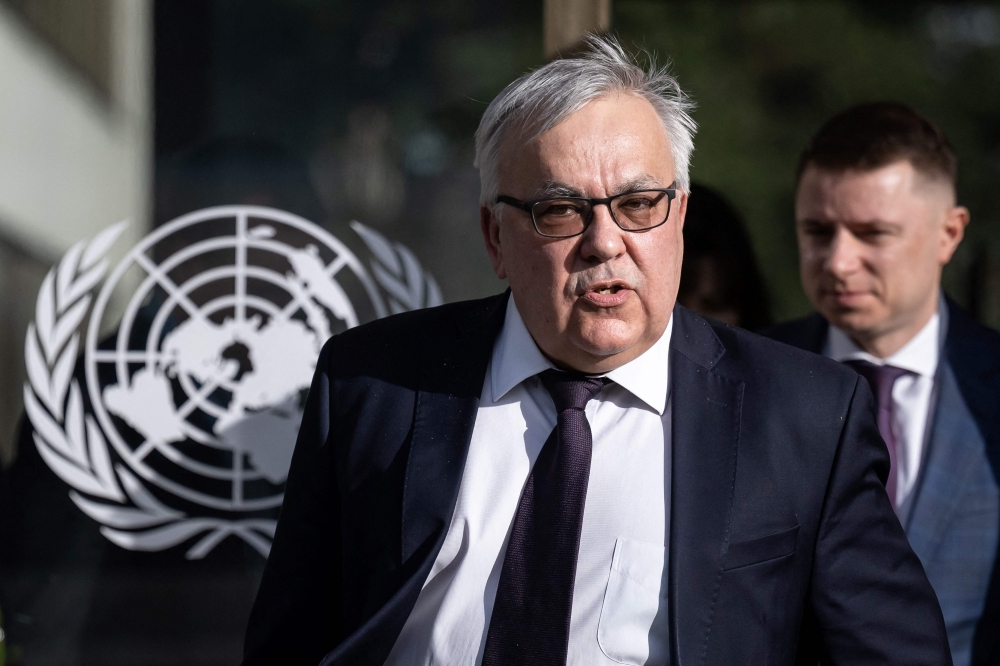 Russian Deputy Foreign Minister Sergei Vershinin leaves after talks on Black Sea grain Initiative at the United Nations in Geneva on March 13, 2023. (Photo by Fabrice Coffrini / AFP)