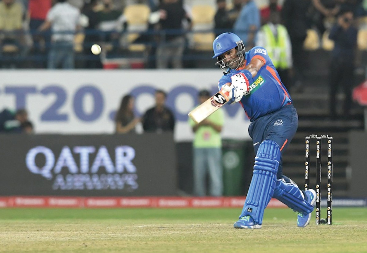 India Maharajas batsman Robin Uthappa hits a boundary.