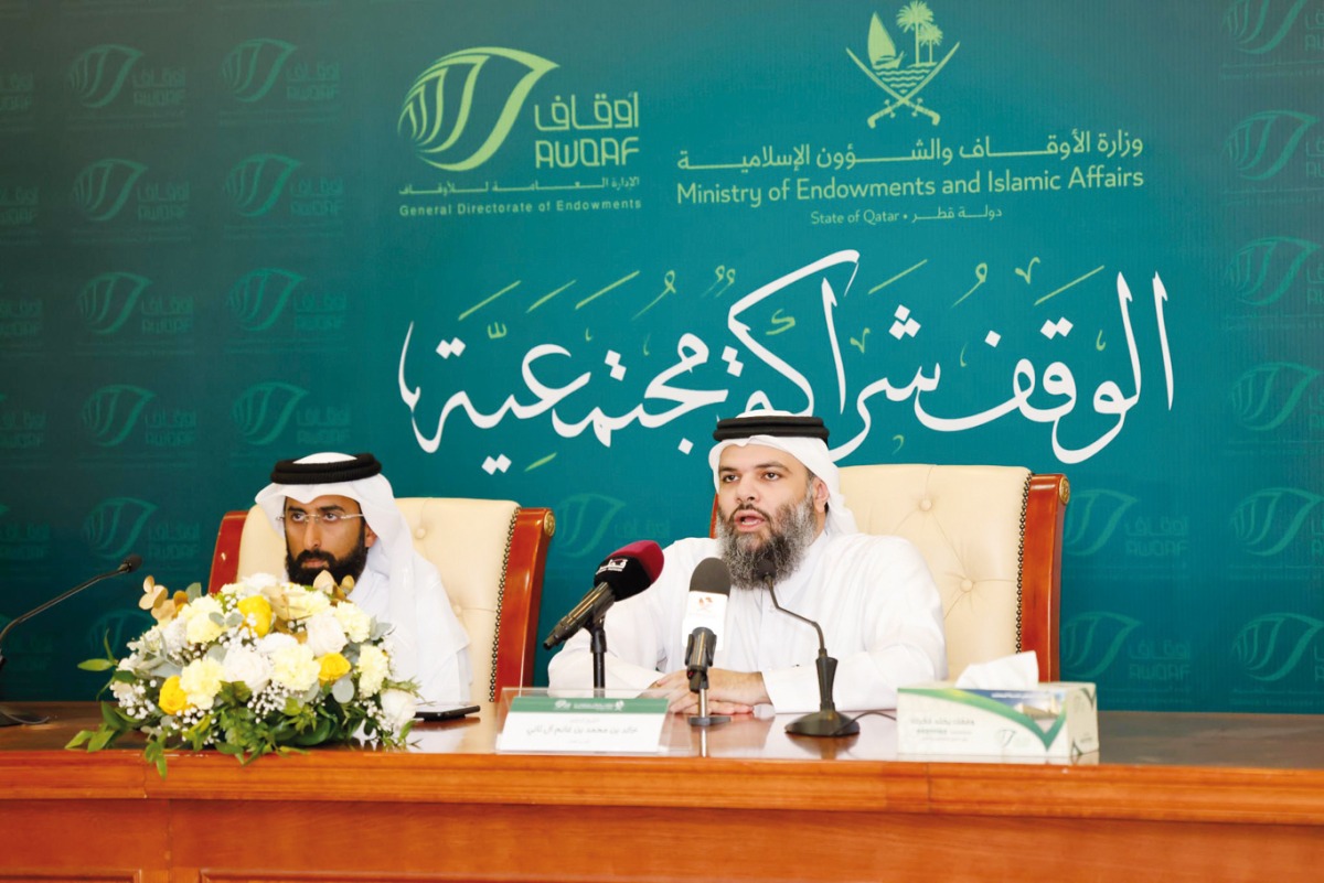 Director-General Endowments Dr. Sheikh Khalid bin Mohammed bin Ghanim Al Thani (right) and Director of Hifz Al Naema Center Eng. Ali Ayed Al Qahtani at the press conference yesterday.  
