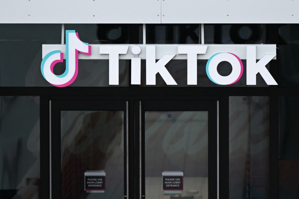 The TikTok logo is displayed on signage outside TikTok social media app company offices in Culver City, California, on March 16, 2023. Photo by Patrick T. Fallon / AFP