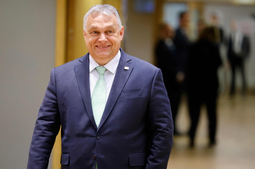 Hungary's Prime Minister Viktor Orban arrives to attend a EU Summit, at the EU headquarters in Brussels, on March 23, 2023. (Photo by Ludovic MARIN / AFP)