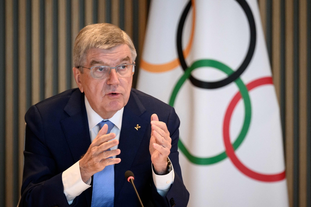 International Olympic Committee (IOC) President Thomas Bach gestures during an IOC executive board meeting where the issue of Russian athletes are discussed, in Lausanne, on March 28, 2023. (Photo by Fabrice Coffrini / AFP)