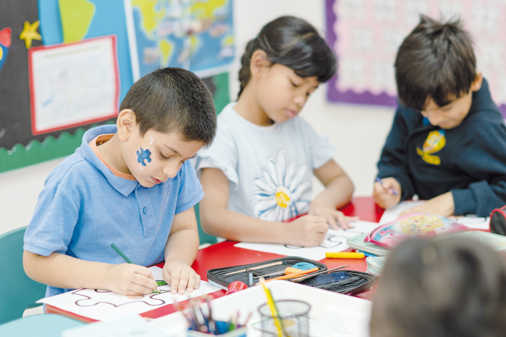 Children taking part in activities of World Autism Awareness Day. 
