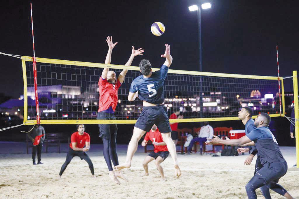 Players in action during Katara Ramadan Beach Volleyball Championship.