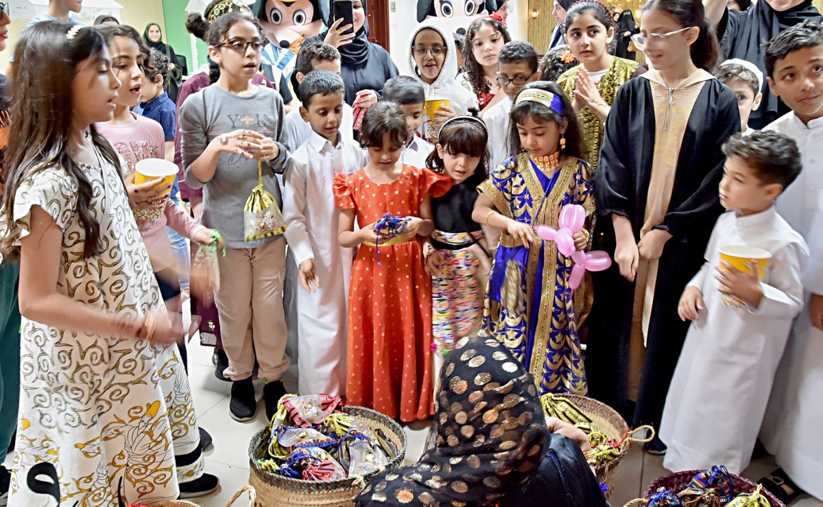 Children collecting Garangao giveaways.