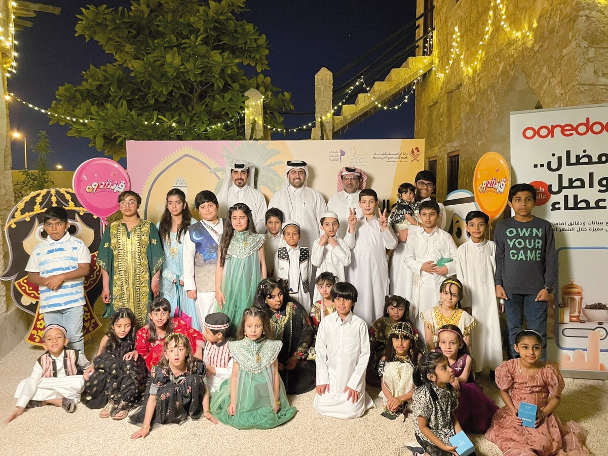 Children with officials at a Garangao event.