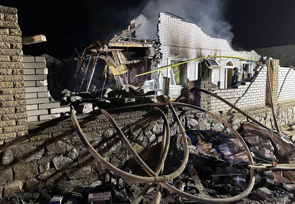 This handout picture taken and released by Ukrainian Presidential Chief of Staff, Andriy Yermak on April 9, 2023, shows a destroyed house after a strike in the city of Zaporizhzhia, amid the Russian invasion of Ukraine. (Photo by Ukrainian Presidential Chief of Staff Andriy Yermak / AFP) 