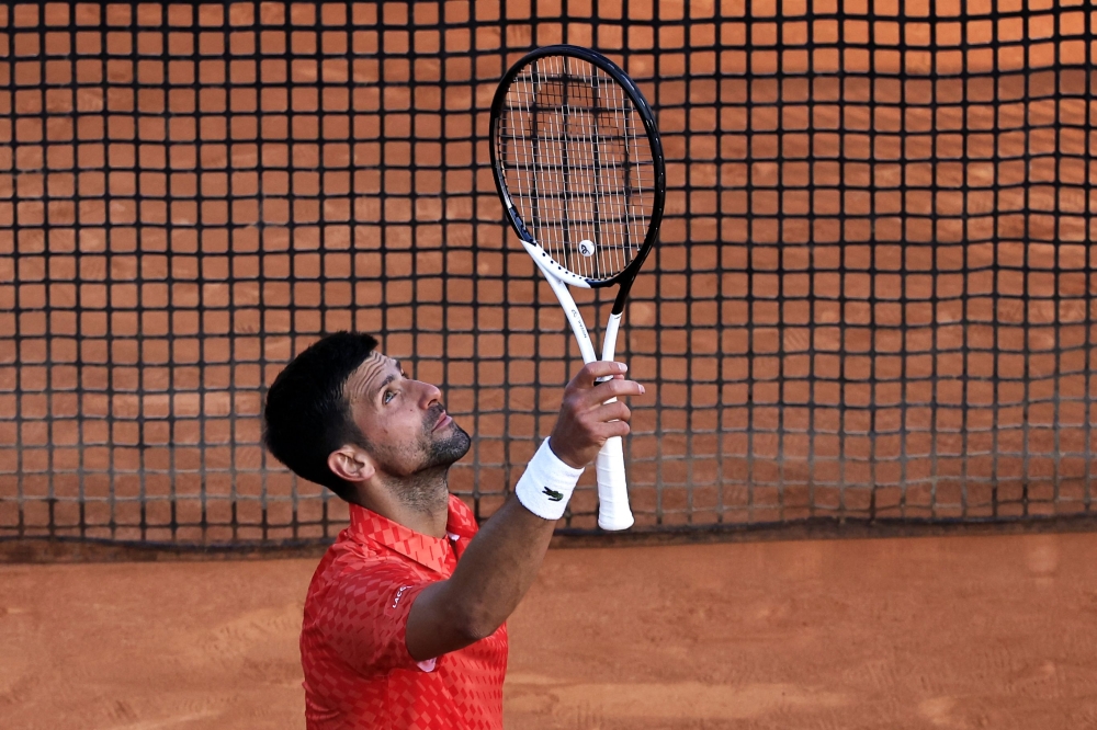 Serbian Novak Djokovic celebrates after winning his Monte-Carlo ATP Masters Series tournament round of 64 tennis match against Ivan Gakhov in Monaco on April 11, 2023. (Photo by Valery Hache / AFP)