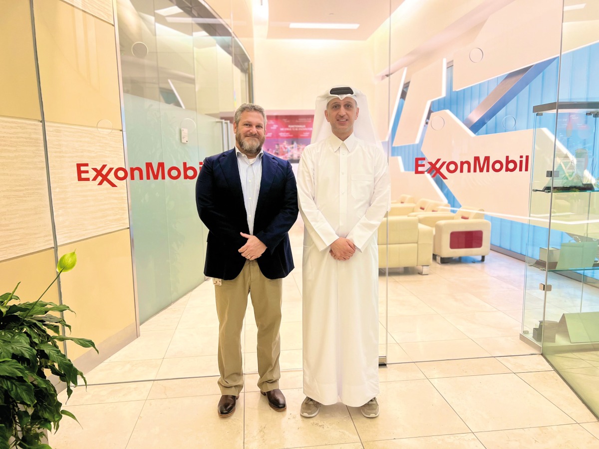 Dr. David Palandro, Vice President and Research Director at EMRQ, (left) with an official during the QSTP Meet The Expert session.