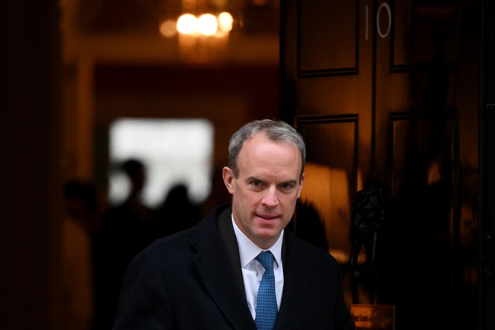 In this file photo taken on January 31, 2023 Britain's Justice Secretary and Deputy Prime Minister Dominic Raab leaves Number 10 Downing Street after the weekly cabinet meeting in London. Photo by Daniel LEAL / AFP