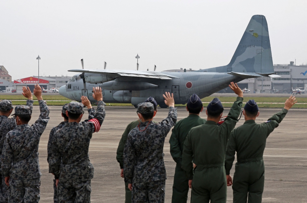 A Japan Air Self-Defense Force C-130 transport plane departs for Djibouti in preparation for the evacuation of Japanese nationals from Sudan, at the Komaki Air Base in Aichi prefecture on April 21, 2023. (Photo by JIJI Press / AFP) / Japan OUT

