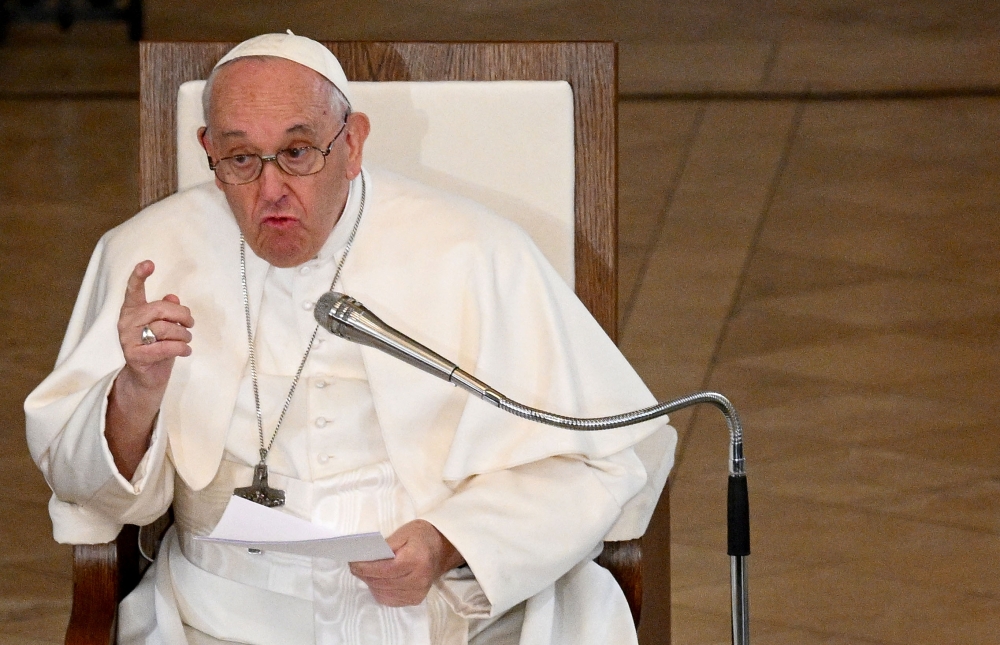 Pope Francis speaks to believers at the St Elizabeth of Hungary Church, where he meets poor people and refugees, during his visit in Budapest, Hungary, April 29, 2023. (Photo by Vincenzo PINTO / AFP)
 