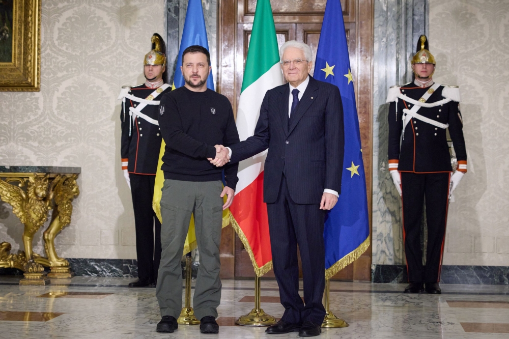 This handout picture taken and released by the Ukrainian Presidential Press Service on May 13, 2023, shows Italian President Sergio Mattarella shaking hands with Ukrainian President Volodymyr Zelensky before their meeting at the Quirinale presidential palace in Rome. (Photo by STRINGER / Ukrainian Presidential Press Service / AFP) 