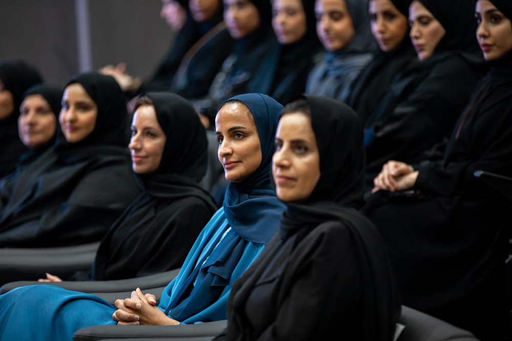 Minister of Education and Higher Education H E Buthaina bint Ali Al Jabr Al Nuaimi (3rd right), Vice-Chairperson and CEO of Qatar Foundation H E Sheikha Hind bint Hamad Al Thani (2nd right), and other officials and students at the session.