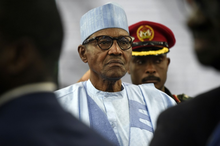 Nigeria's President Muhammadu Buhari said he will leave office with Nigeria better in 2023 than in 2015.  (AFP / Haidar Mohammed Ali)