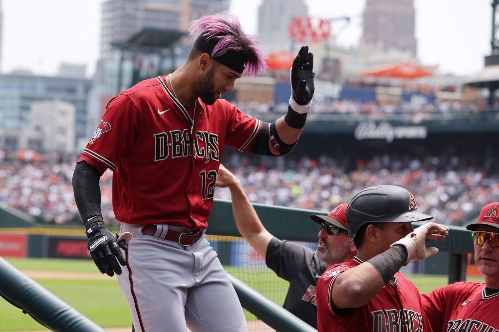 Lourdes Gurriel Jr. #12 of the Arizona Diamondbacks celebrates his fifth inning three run home run with teammates while playing the Detroit Tigers at Comerica Park on June 10, 2023 in Detroit, Michigan. Gregory Shamus/Getty Images/AFP (Photo by Gregory Shamus / GETTY IMAGES NORTH AMERICA / Getty Images via AFP)