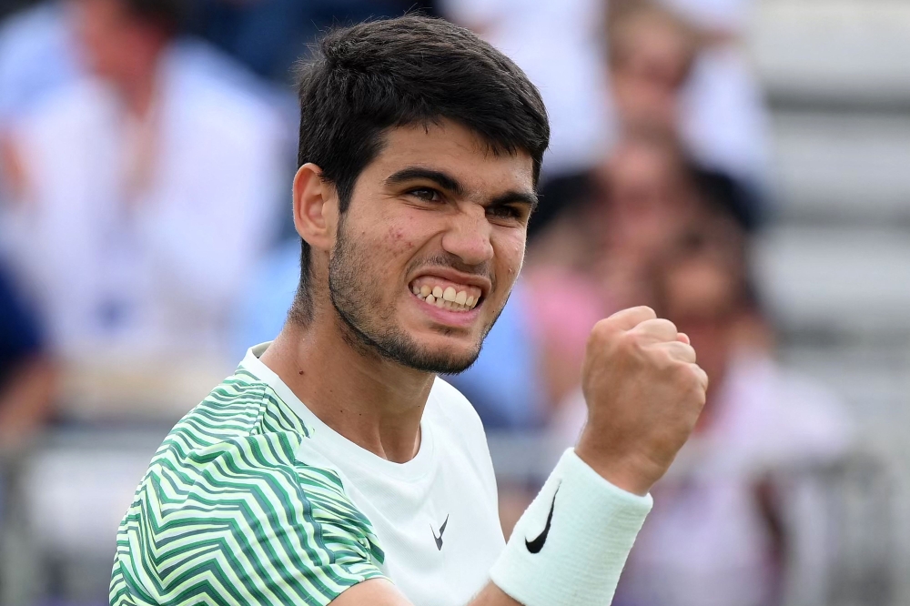 Spain's Carlos Alcaraz celebrates winning a point against Czech Republic's Jiri Lehecka (Photo by Daniel LEAL / AFP)