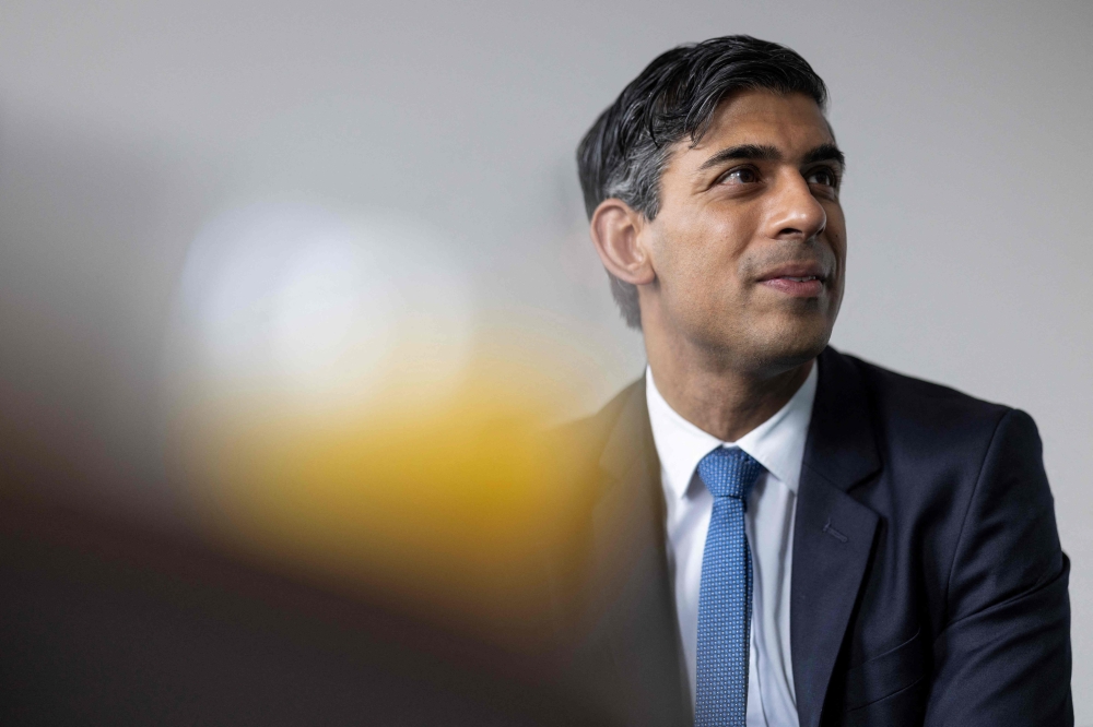 Britain's Prime Minister Rishi Sunak visits the NHS-run Addenbrooke's Hospital in Cambridge on June 30, 2023. (Photo by Dan Kitwood / POOL / AFP)